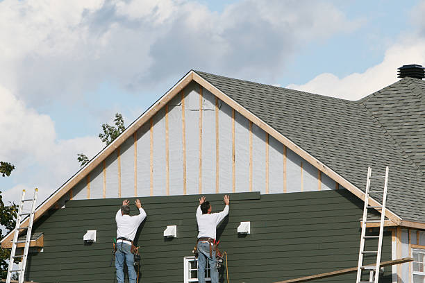 Professional Siding Installation technician working in Monroe, OH